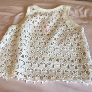 White sleeveless top